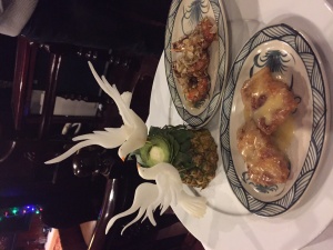 Dinner with fancy sculpture